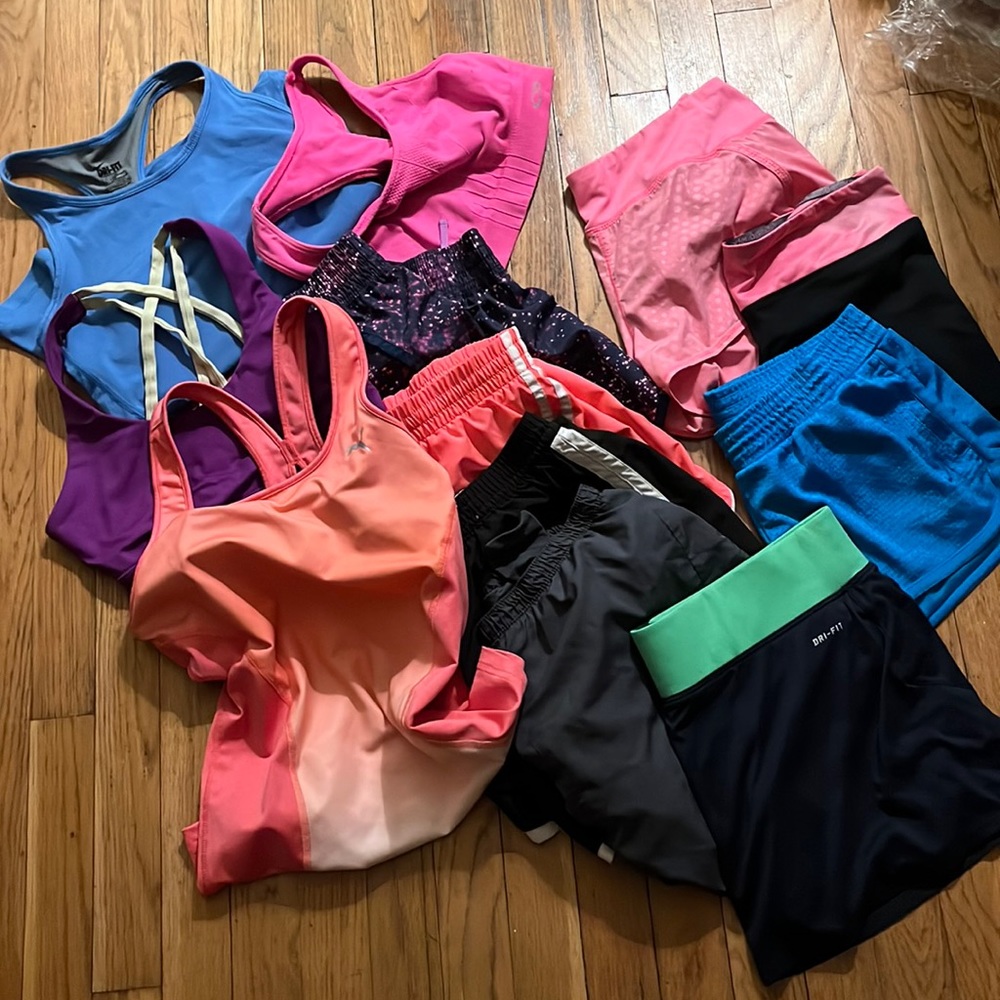 Large lot of women’s Size medium athletic wear shorts bras athletic tops skort